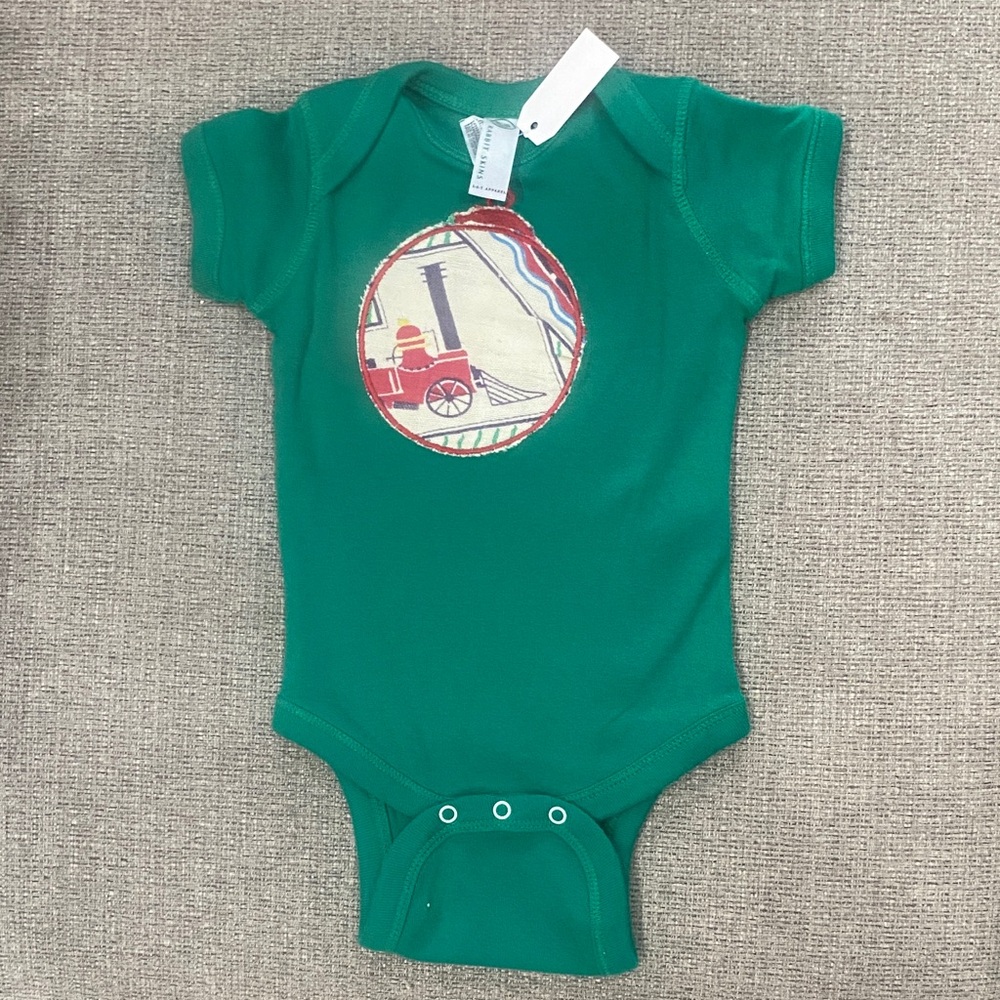 Rabbit Skins Green Onesie with Train Appliquéd with Vintage Quilt